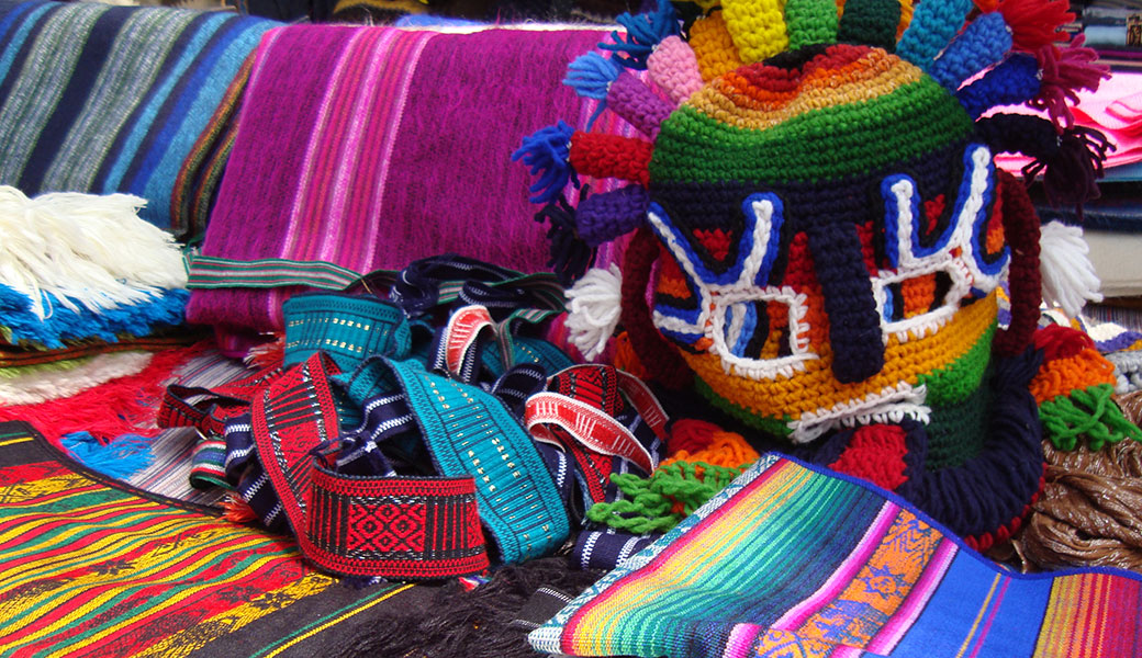 Colourful weavings in Otavalo Market in Ecuador
